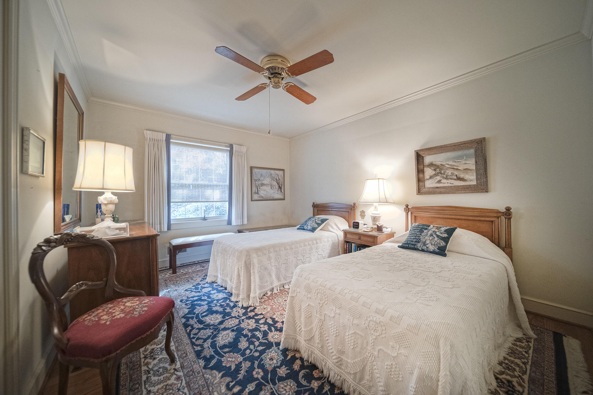 3173 Stoneridge Road Southwest Roanoke, VA 24014 - Photo 16 of 31 a bedroom with two beds and a chandelier