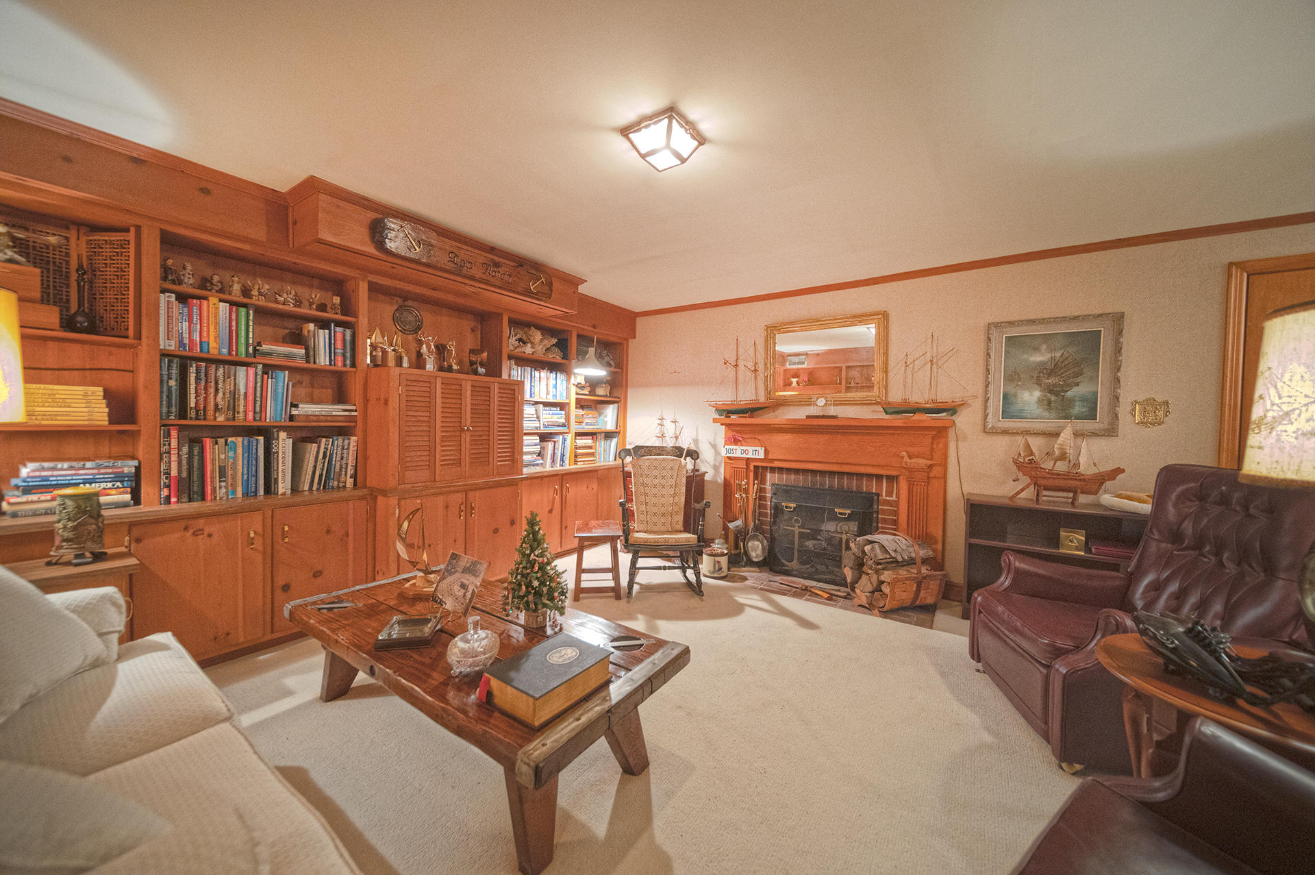 3173 Stoneridge Road Southwest Roanoke, VA 24014 - Photo 23 of 31 a living room with furniture and a flat screen tv