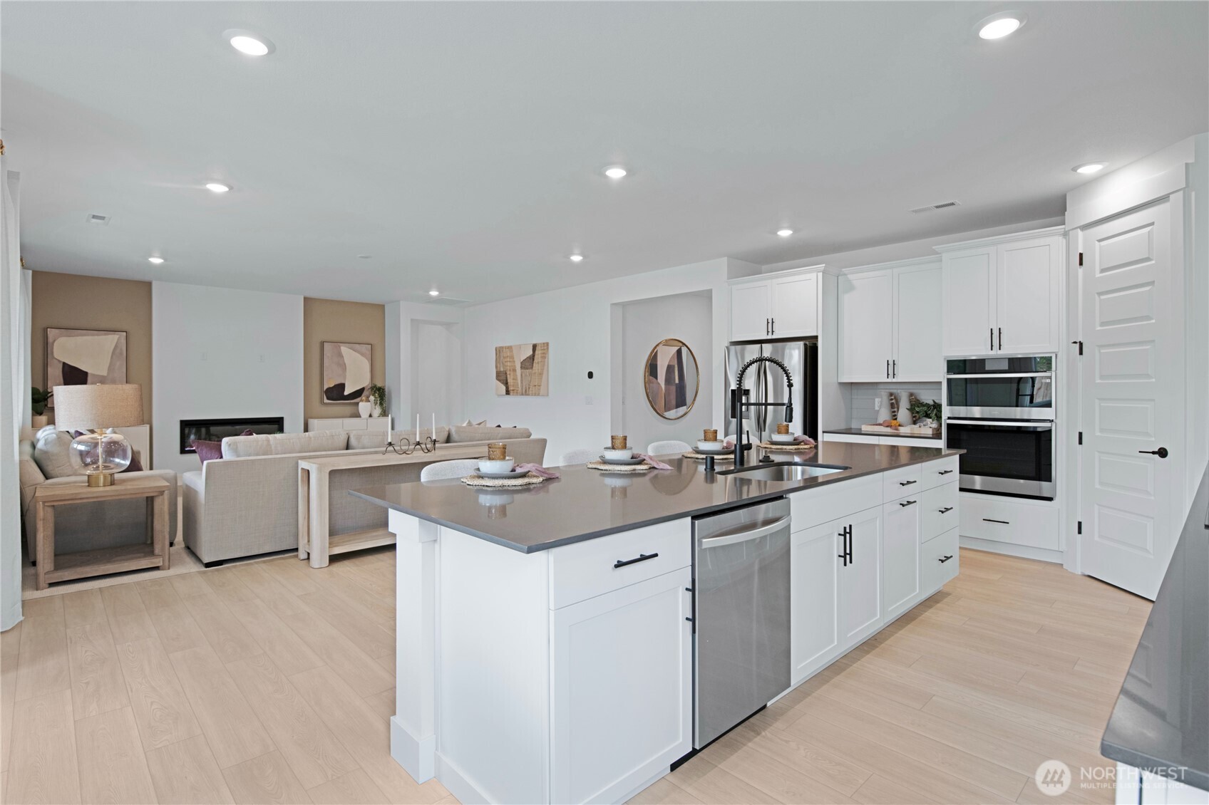 637 Gooseberry Place Sequim, WA 98382 - Photo 4 of 13 a kitchen with appliances a sink and cabinets