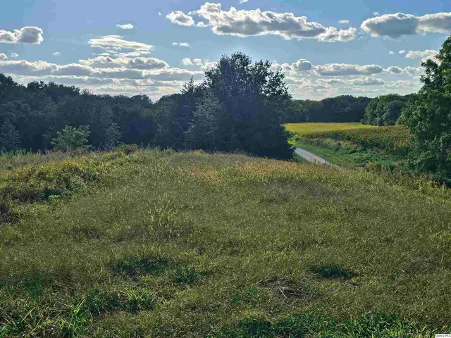 a view of lake with mountain