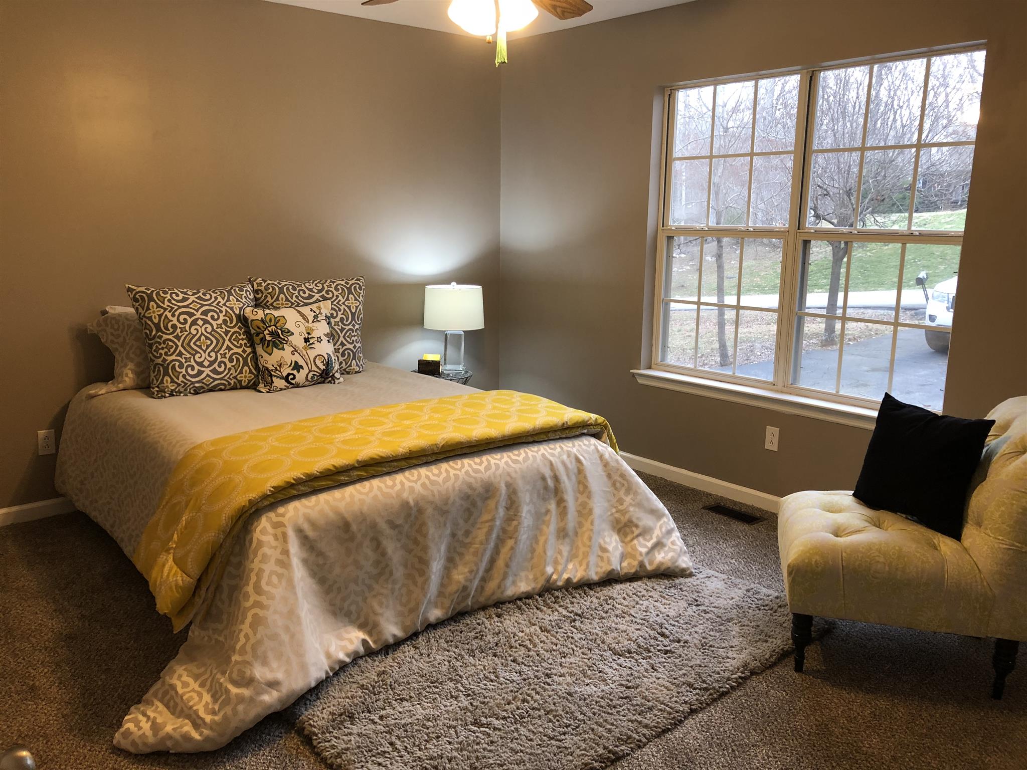 140 Gaskins Road Dickson, TN 37055 - Photo 16 of 27 a bedroom with a bed and window