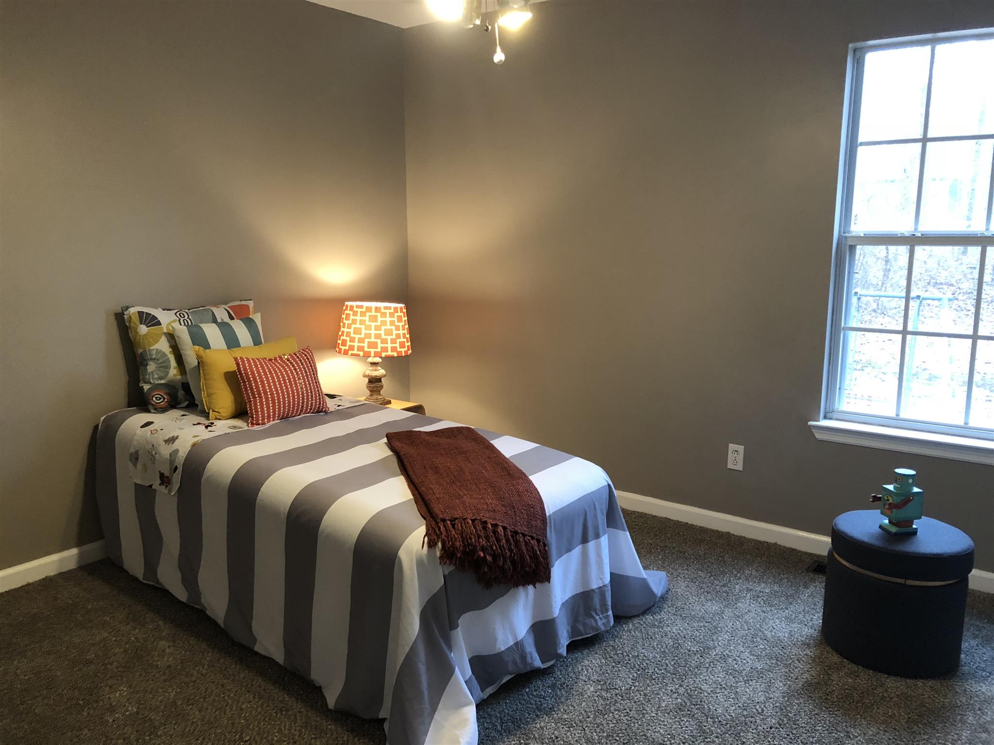 140 Gaskins Road Dickson, TN 37055 - Photo 17 of 27 a bedroom with a bed and window