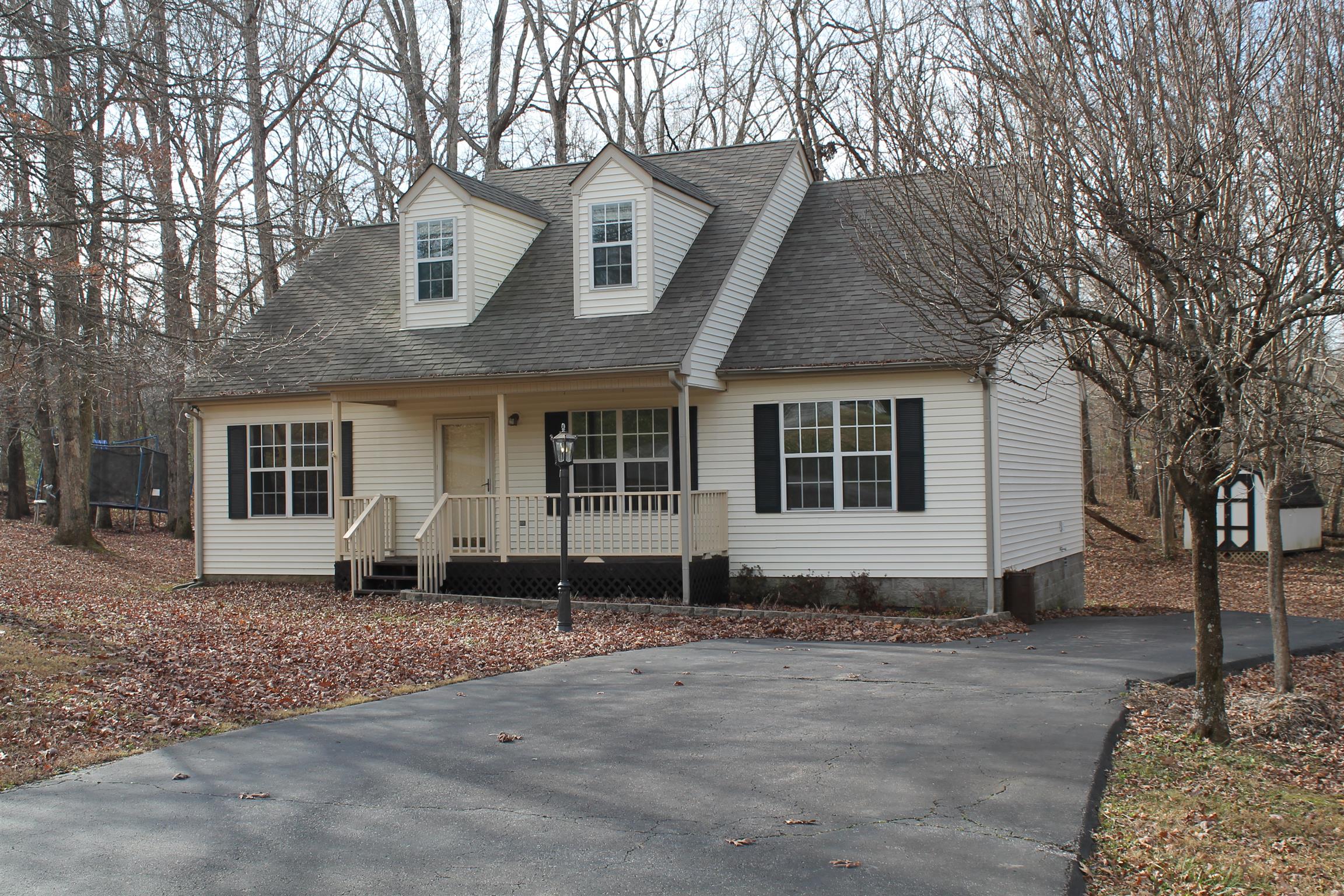 140 Gaskins Road Dickson, TN 37055 - Photo 2 of 27 a front view of a house with a yard