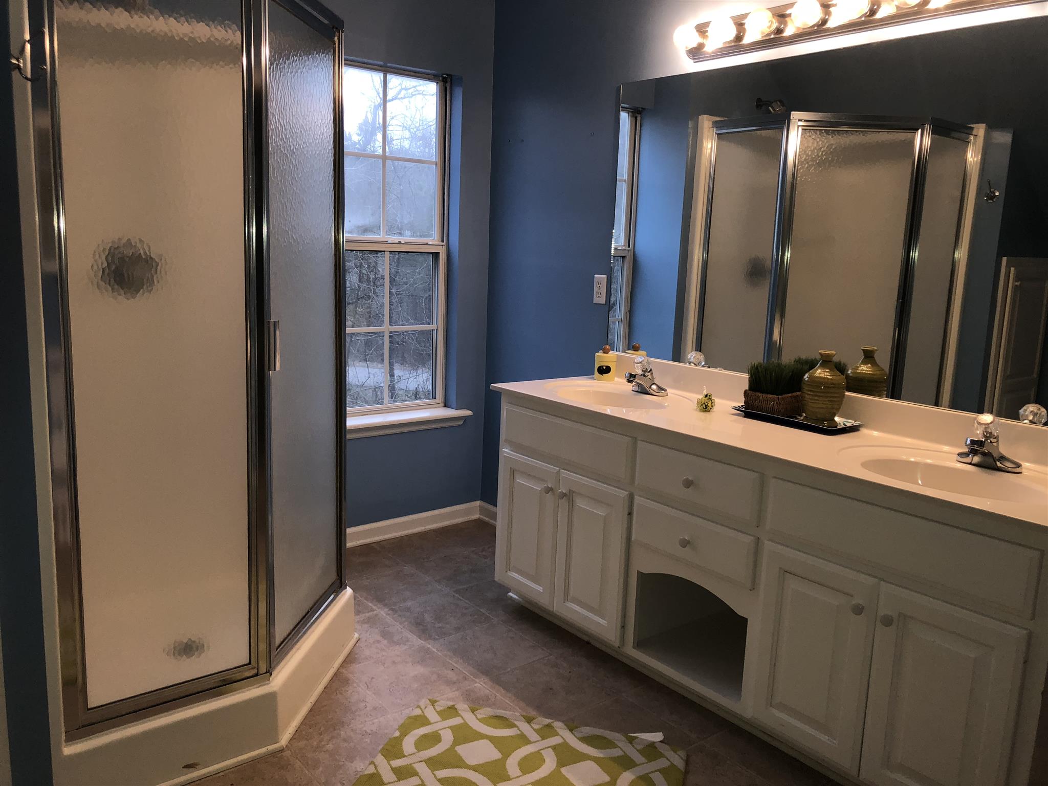 140 Gaskins Road Dickson, TN 37055 - Photo 21 of 27 a bathroom with a double vanity sink and a mirror