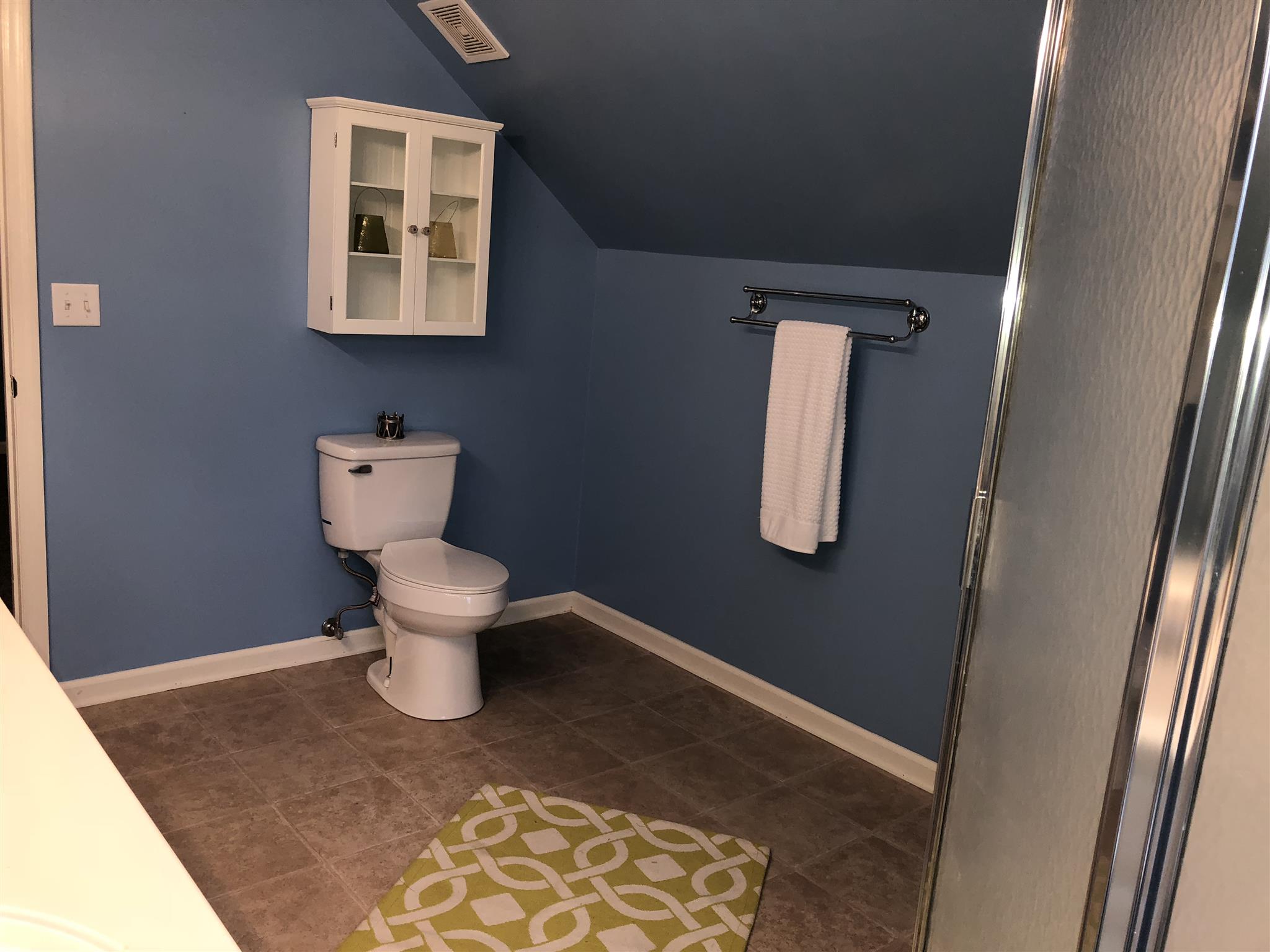 140 Gaskins Road Dickson, TN 37055 - Photo 22 of 27 a bathroom with a toilet and a mirror