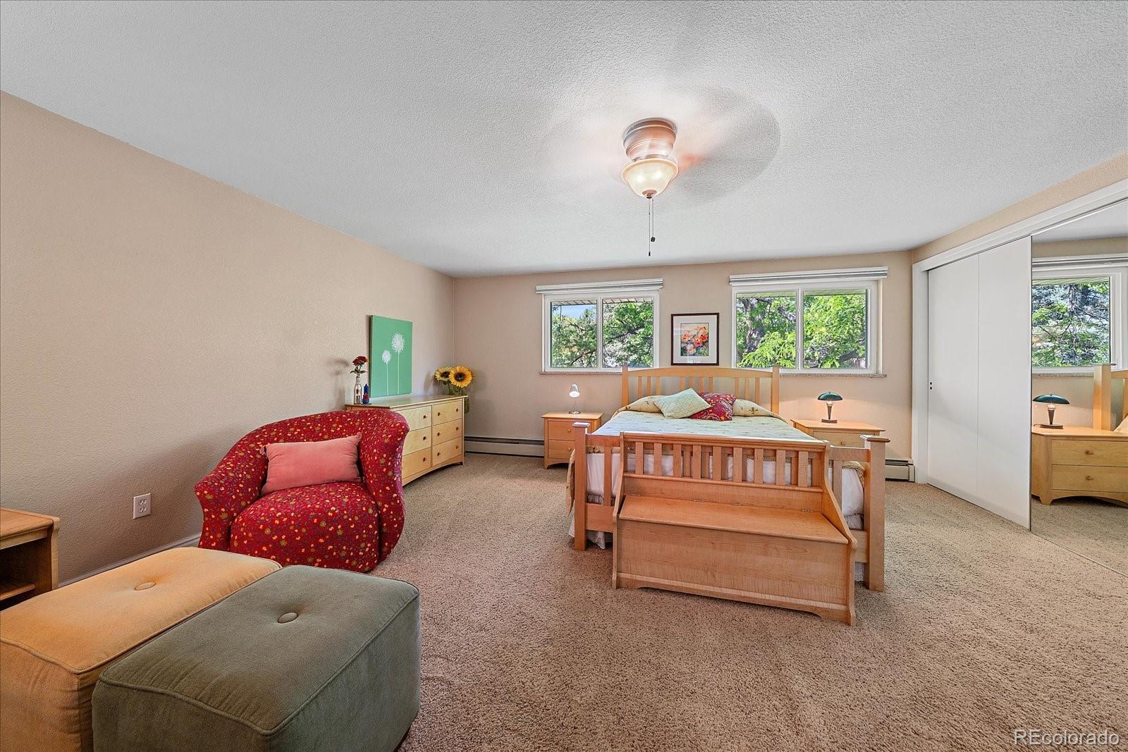 930 Reed Court Lakewood, CO 80214 - Photo 26 of 41 a bed room with two beds and a window