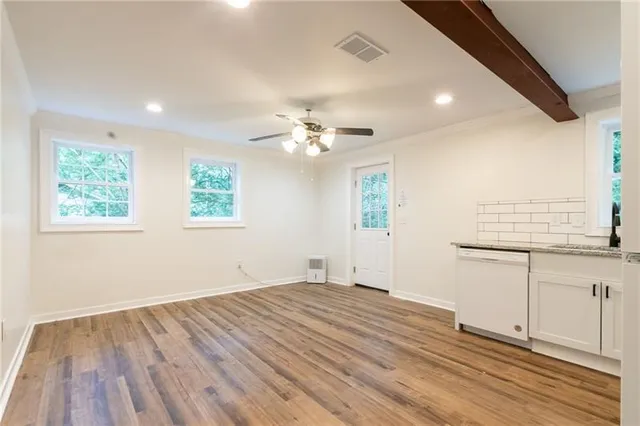 a view of kitchen and windows