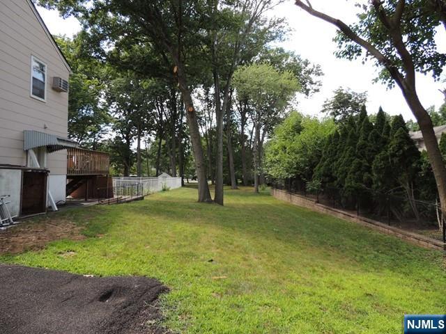 375 Chelsea Street Paramus, NJ 07652 - Photo 11 of 19 a view of a trees in a yard with trees