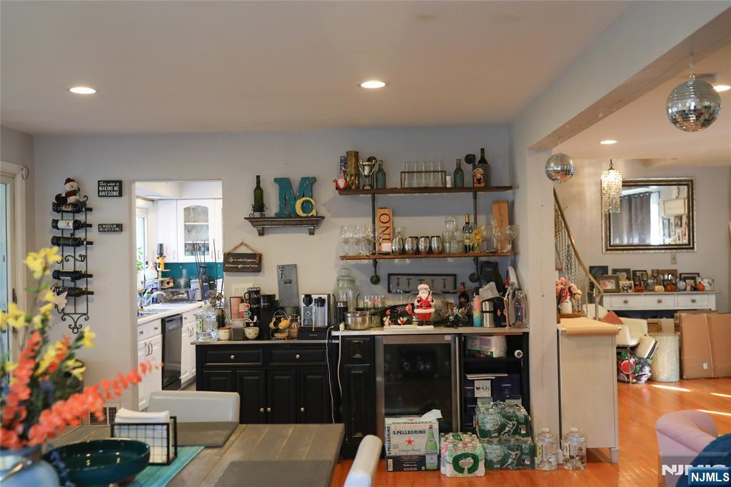 375 Chelsea Street Paramus, NJ 07652 - Photo 14 of 19 a room with lots of bottles of alcohol