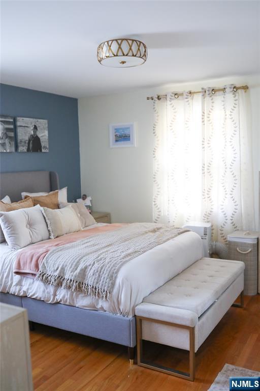 375 Chelsea Street Paramus, NJ 07652 - Photo 18 of 19 a bedroom with a bed and window