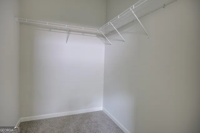 a view of a room with racks on the wall