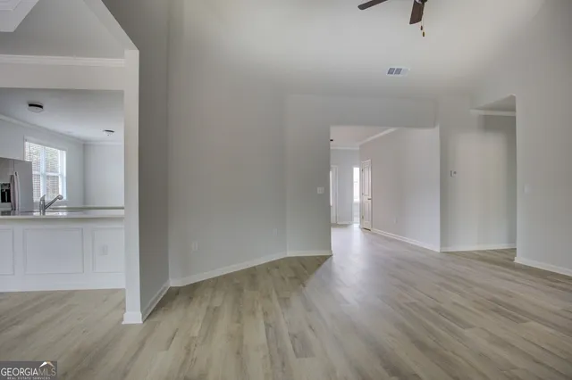 a view of a livingroom with wooden floor