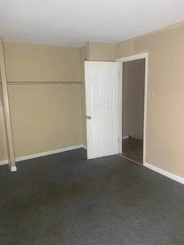 a view of a room with an empty space