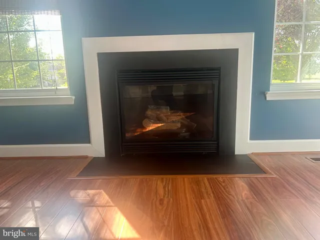 a living room with a fireplace