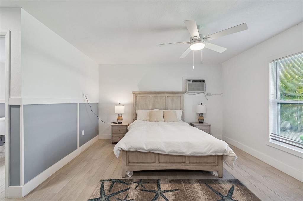 330 6th Avenue Indian Rocks Beach, FL 33785 - Photo 23 of 52 a bedroom with a bed and window