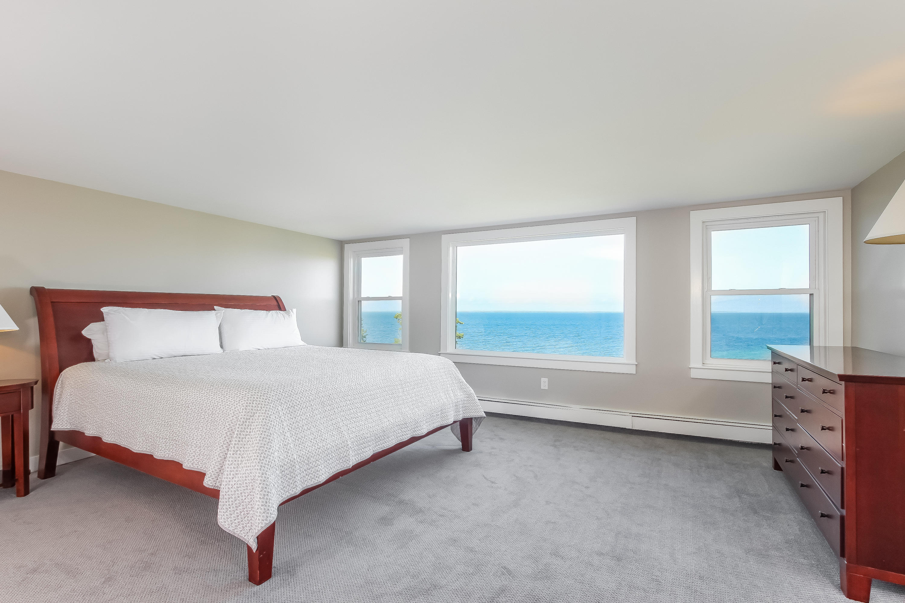 37 Beccles Road Falmouth, MA 02540 - Photo 11 of 32 a large bed sitting in a bedroom next to a window