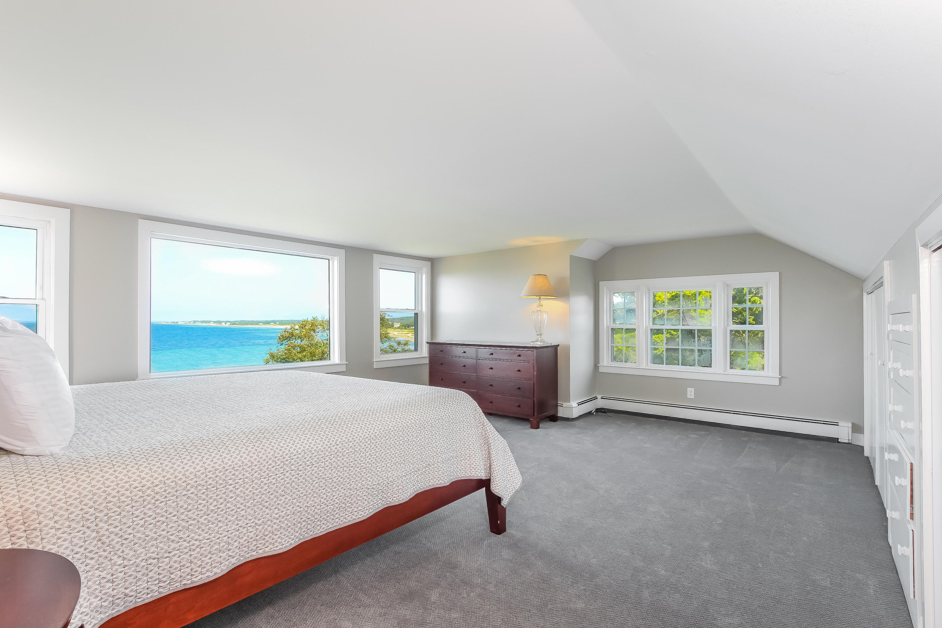 37 Beccles Road Falmouth, MA 02540 - Photo 12 of 32 a bed sitting in a spacious bedroom next to a window