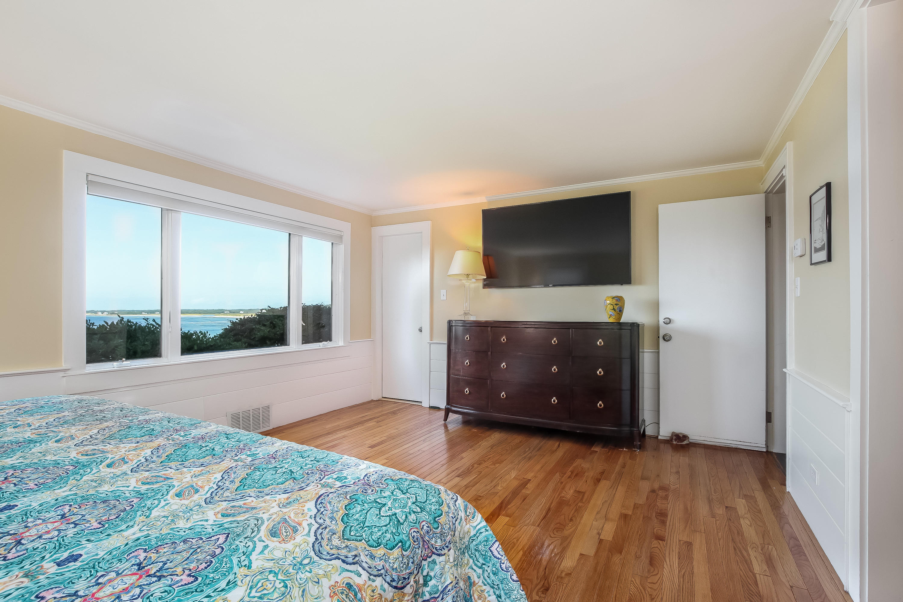 37 Beccles Road Falmouth, MA 02540 - Photo 14 of 32 a bedroom with a bed and a flat screen tv