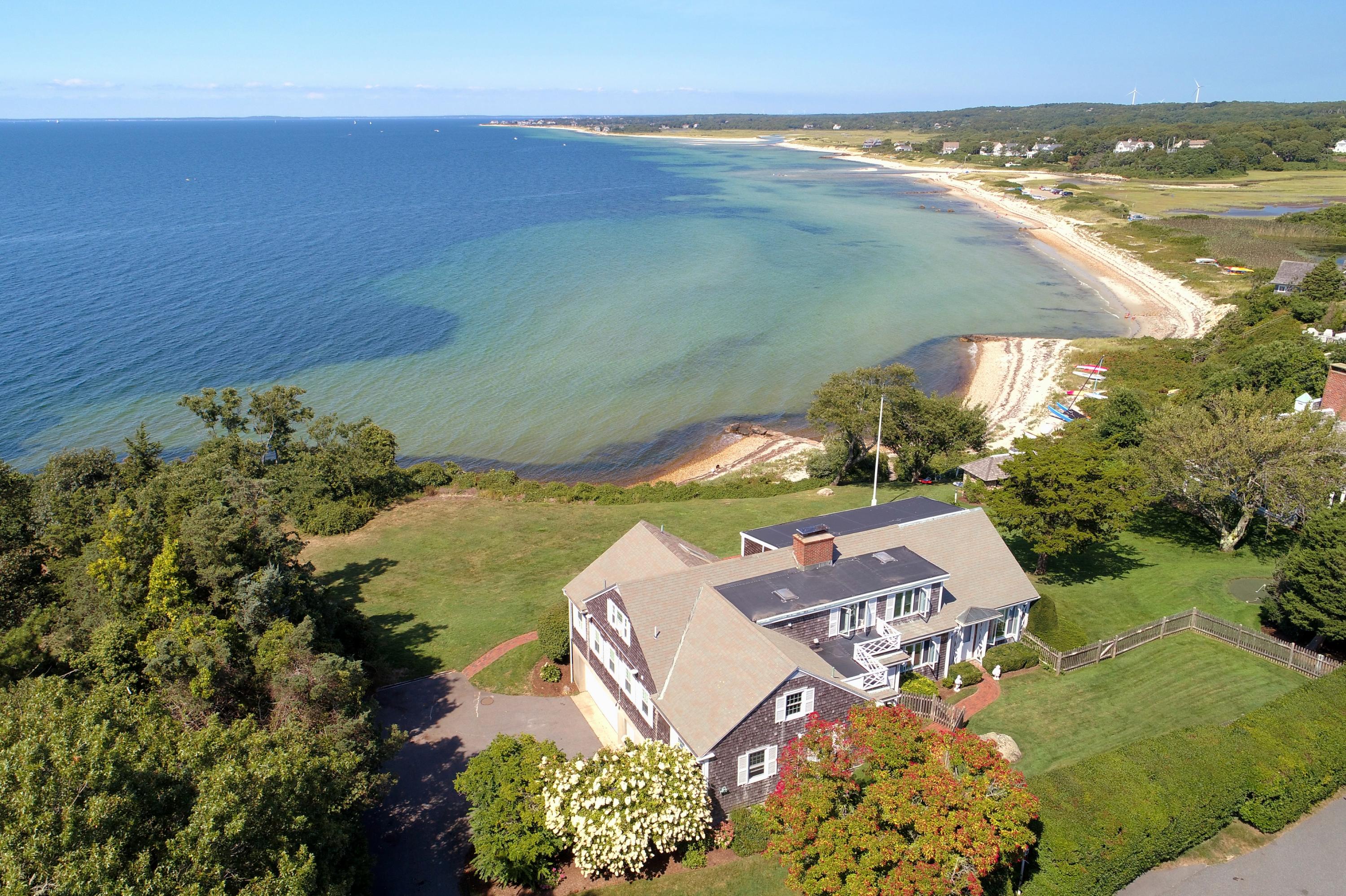 37 Beccles Road Falmouth, MA 02540 - Photo 2 of 32 an aerial view of a house with a lake view