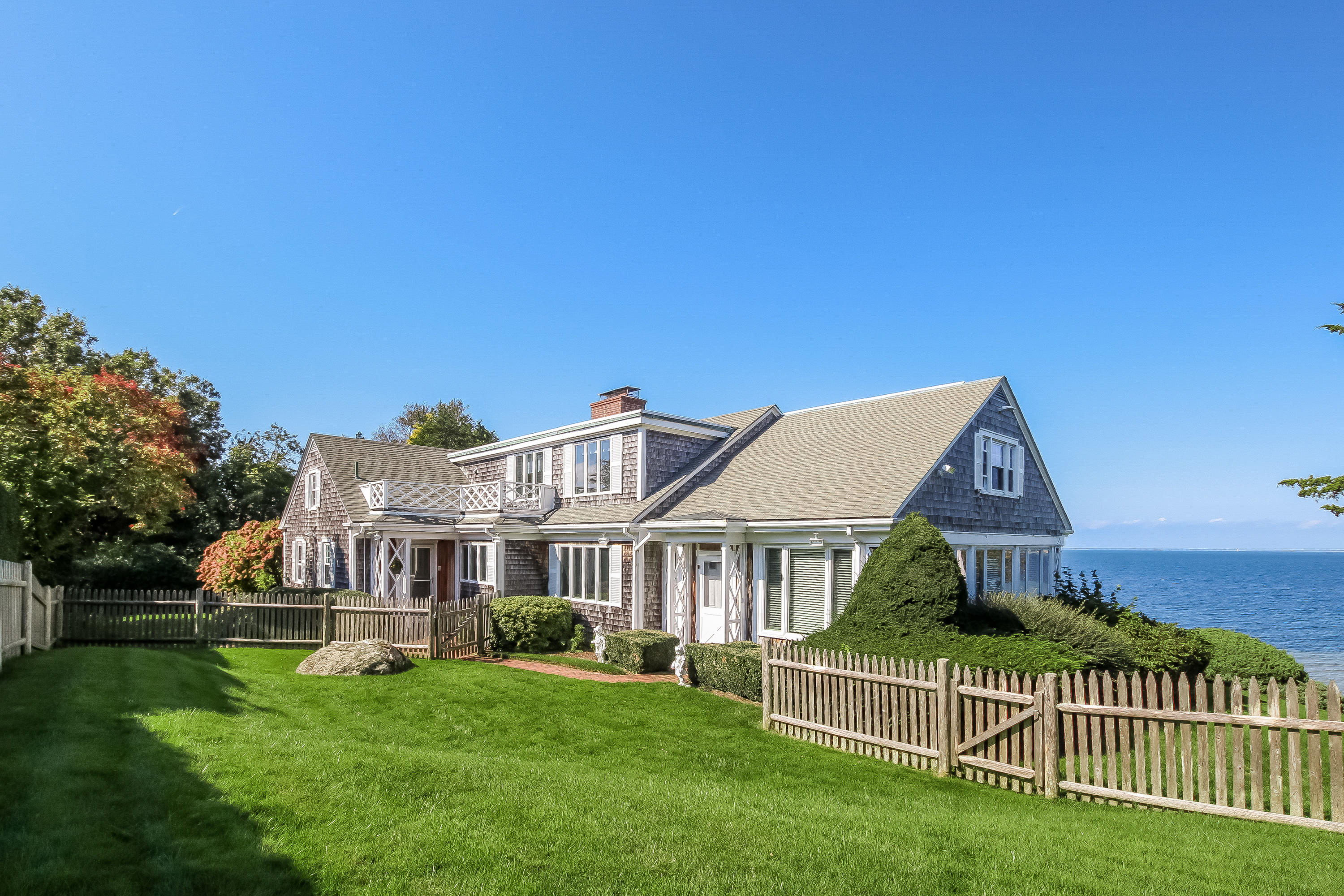 37 Beccles Road Falmouth, MA 02540 - Photo 22 of 32 a view of a house with a yard and a porch