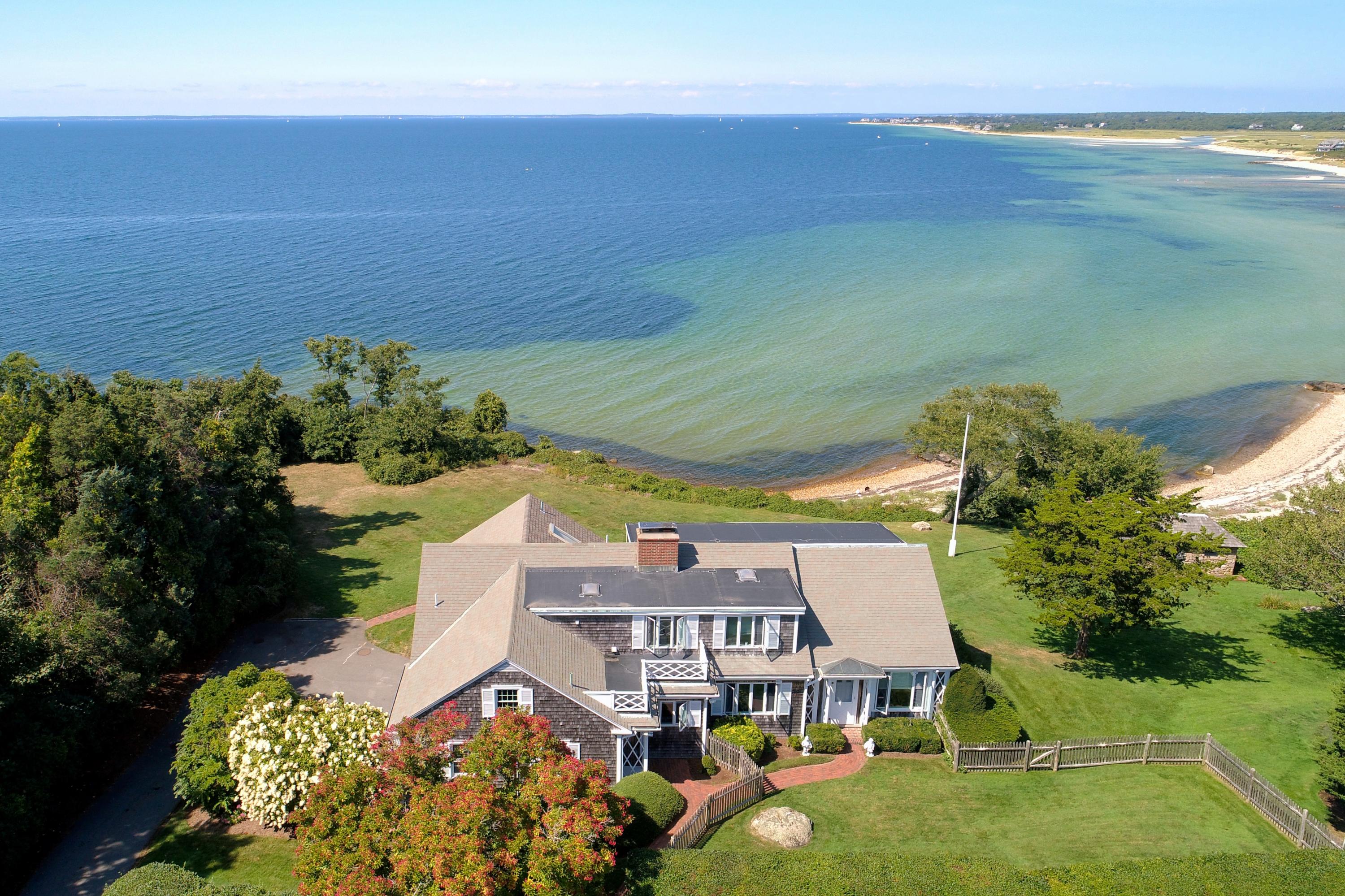37 Beccles Road Falmouth, MA 02540 - Photo 23 of 32 an aerial view of a house with a garden and lake view