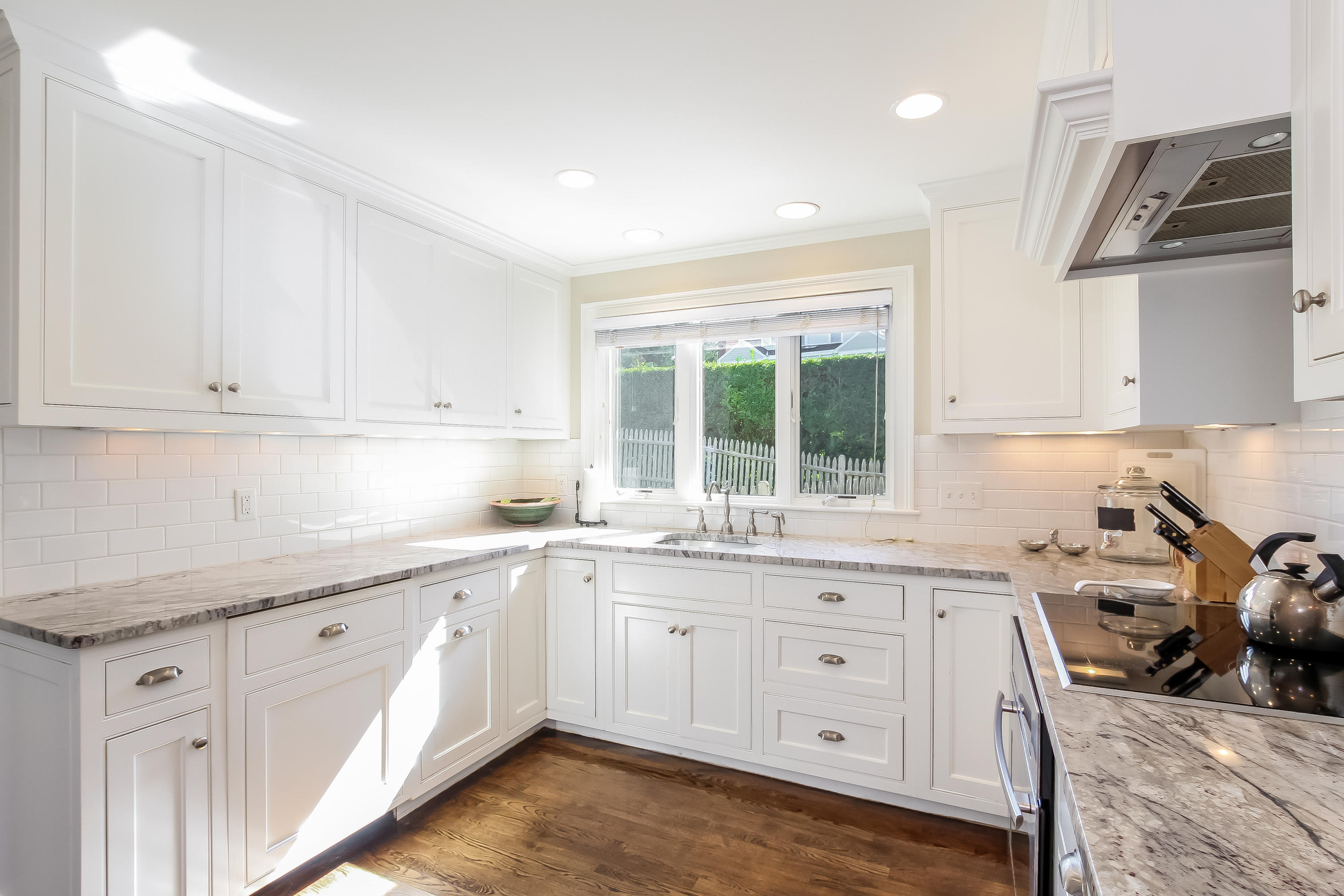 37 Beccles Road Falmouth, MA 02540 - Photo 6 of 32 a kitchen that has a lot of cabinets in it and wooden floors