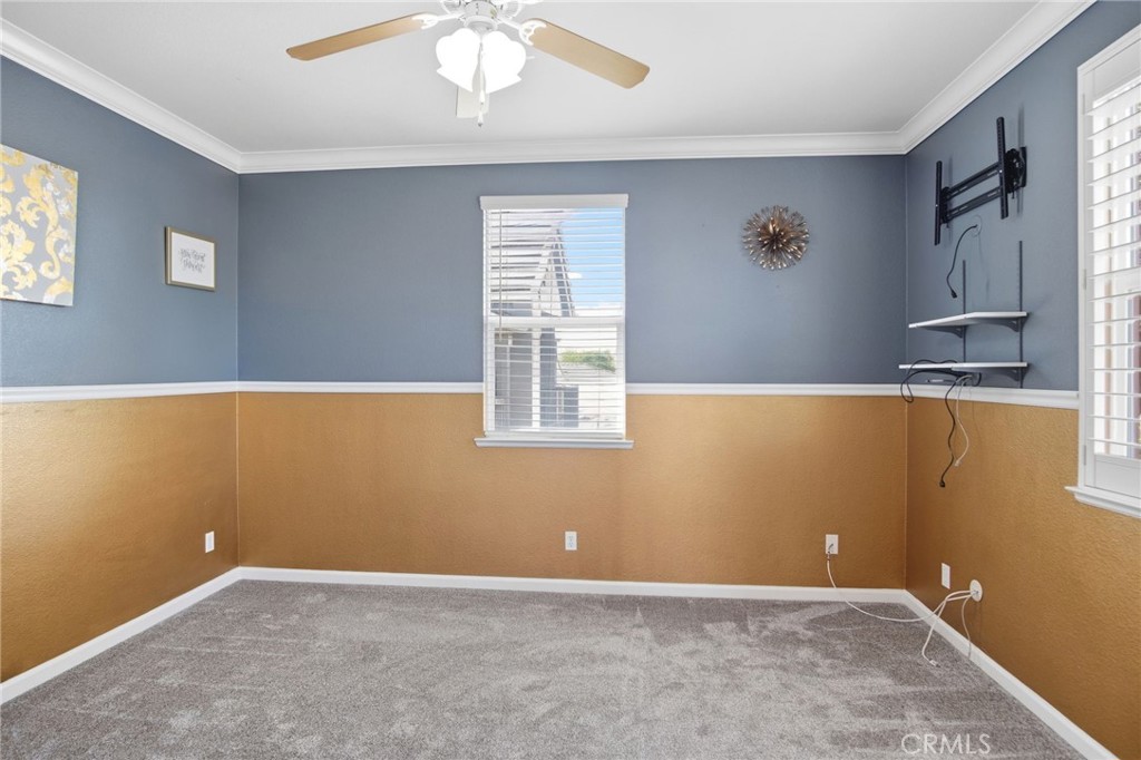4822 Durant Way Merced, CA 95348 - Photo 20 of 48 an empty room with windows