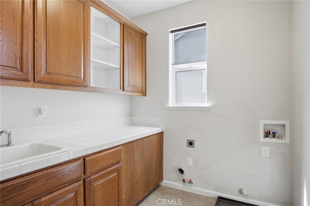 4822 Durant Way Merced, CA 95348 - Photo 25 of 48 a view of cabinets with sink