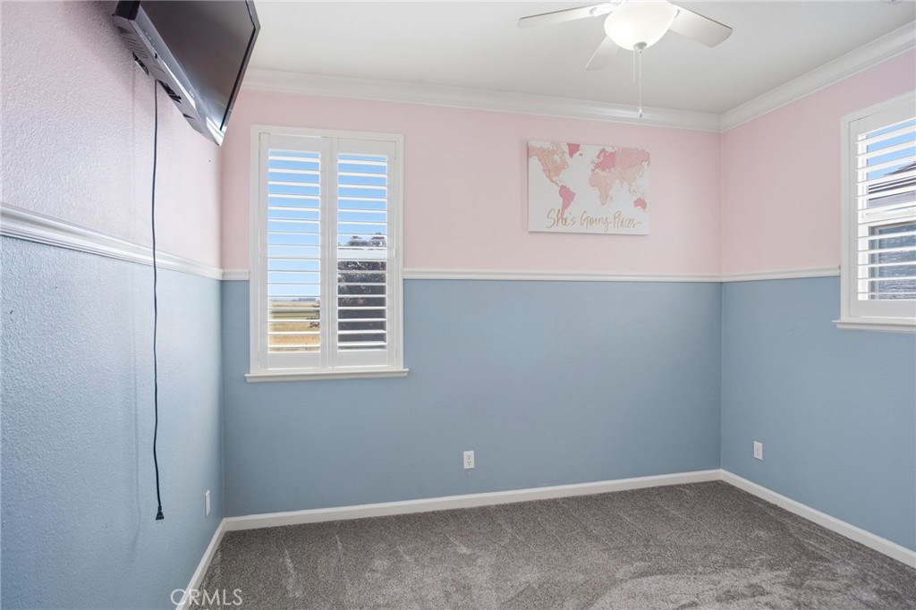 4822 Durant Way Merced, CA 95348 - Photo 27 of 48 an empty room with windows