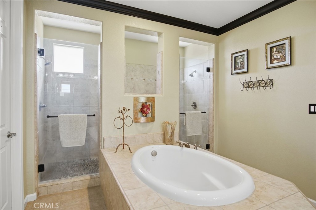 4822 Durant Way Merced, CA 95348 - Photo 33 of 48 a bathroom with a bathtub and shower
