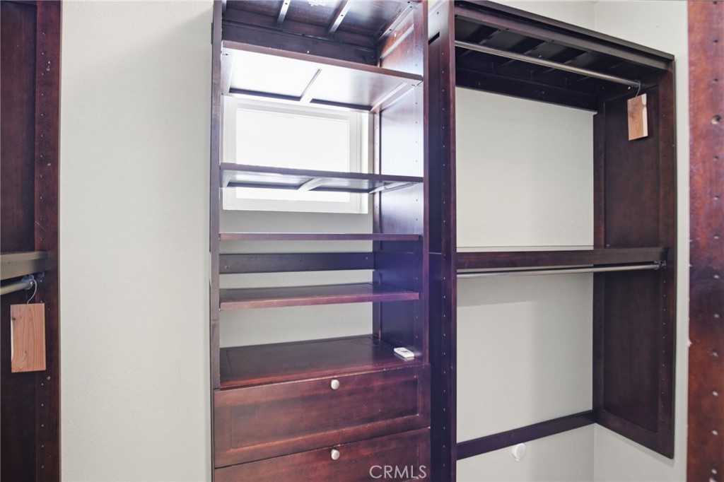 4822 Durant Way Merced, CA 95348 - Photo 34 of 48 a view of walk in closet with empty racks