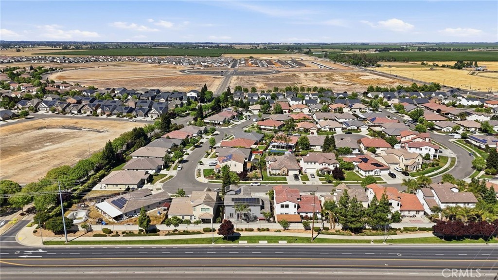 4822 Durant Way Merced, CA 95348 - Photo 43 of 48 an aerial view of residential houses with outdoor space