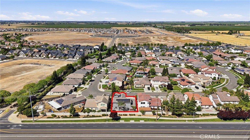 4822 Durant Way Merced, CA 95348 - Photo 48 of 48 an aerial view of residential building and lake view