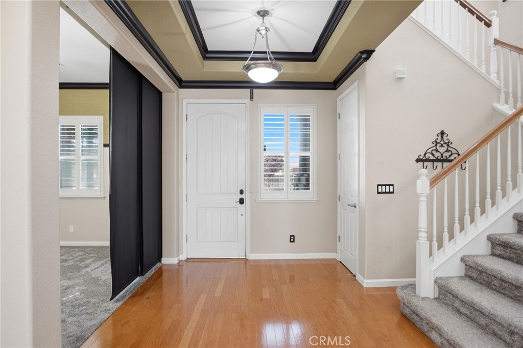 4822 Durant Way Merced, CA 95348 - Photo 7 of 48 a view of empty room with wooden floor and fan