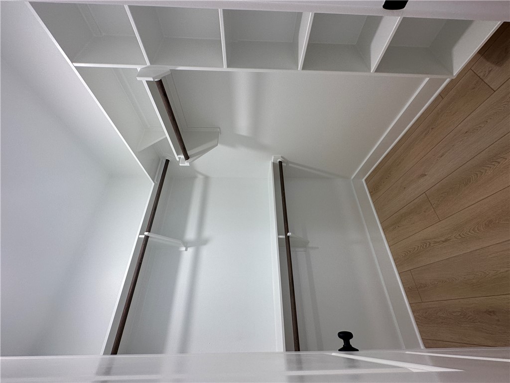 4302 Conestogo Court Bryan, TX 77802 - Photo 21 of 34 a view of an empty walk in closet