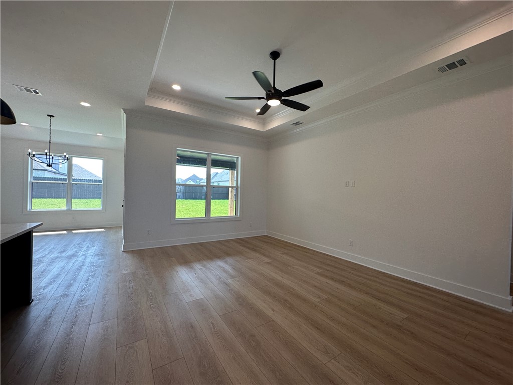 4302 Conestogo Court Bryan, TX 77802 - Photo 24 of 34 a view of empty room with wooden floor and fan