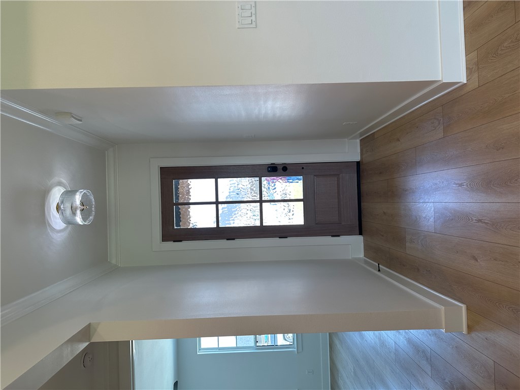 4302 Conestogo Court Bryan, TX 77802 - Photo 5 of 34 an empty room with wooden floor and windows