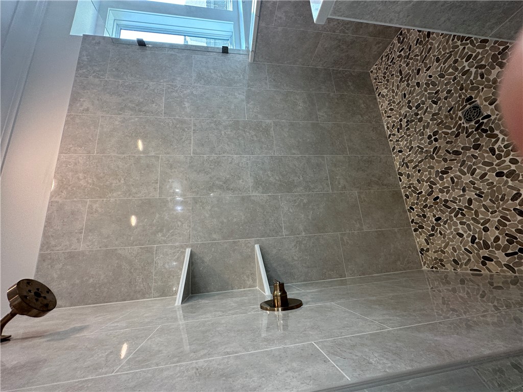 4302 Conestogo Court Bryan, TX 77802 - Photo 8 of 34 a bathroom with a shower