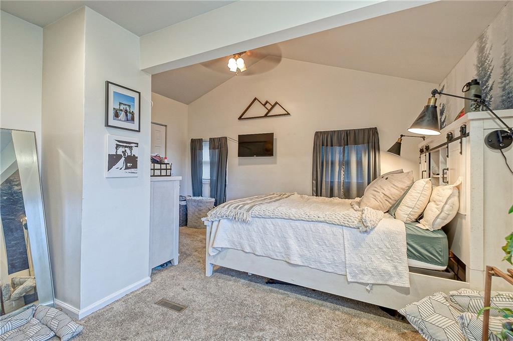 1318 Oakridge Road McDonald, PA 15057 - Photo 11 of 25 a bedroom with a bed and a painting on the wall