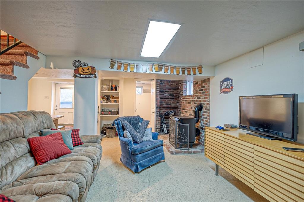 1318 Oakridge Road McDonald, PA 15057 - Photo 18 of 25 a living room with furniture and a flat screen tv