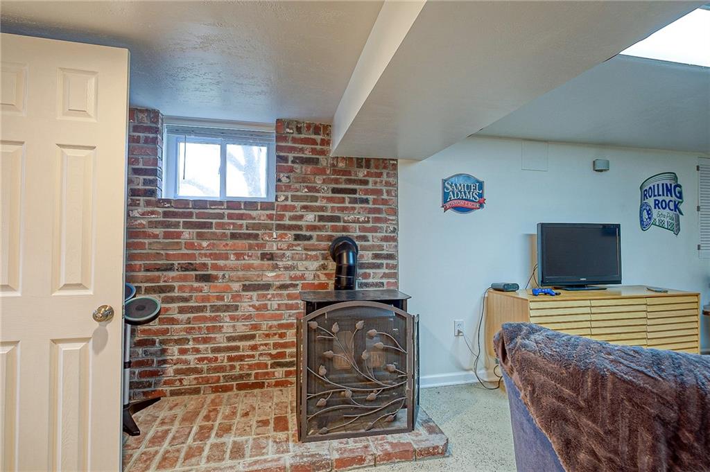 1318 Oakridge Road McDonald, PA 15057 - Photo 20 of 25 a bedroom with a bed and a flat screen tv
