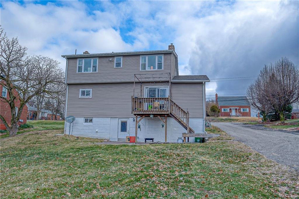 1318 Oakridge Road McDonald, PA 15057 - Photo 3 of 25 front view of a house with a yard