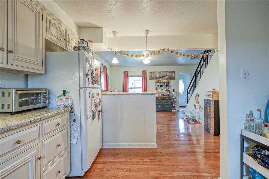 1318 Oakridge Road McDonald, PA 15057 - Photo 6 of 25 a view of a kitchen and utility room