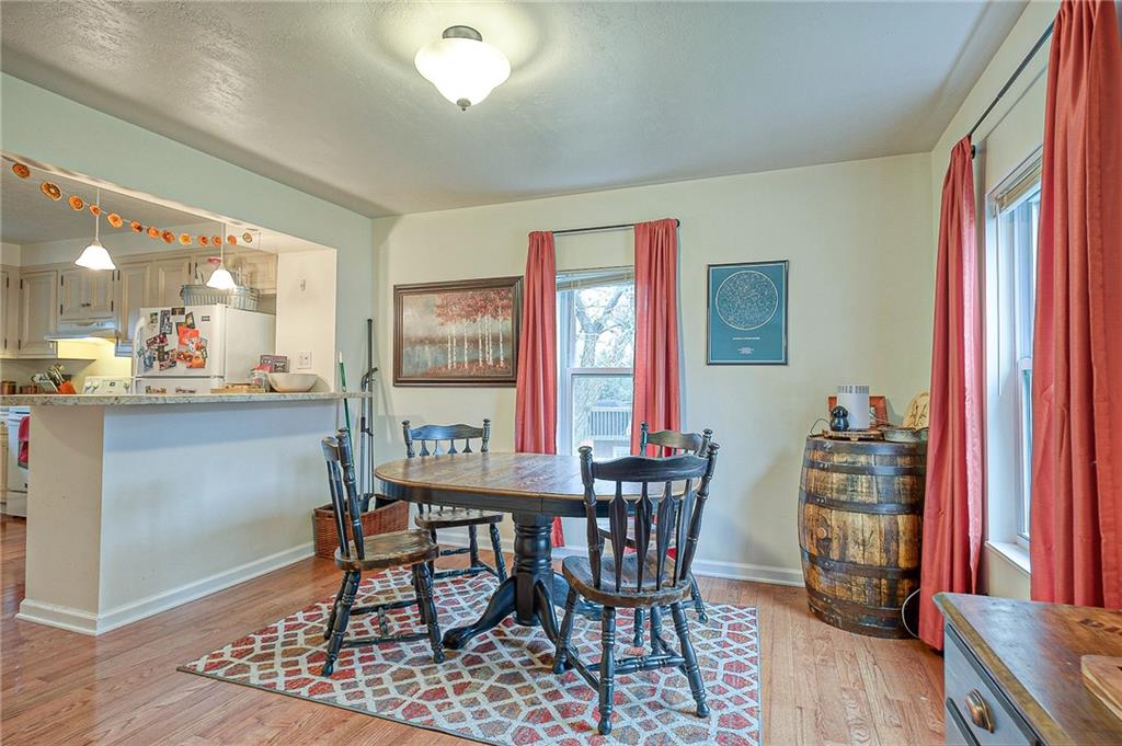 1318 Oakridge Road McDonald, PA 15057 - Photo 7 of 25 a dining room with furniture and wooden floor
