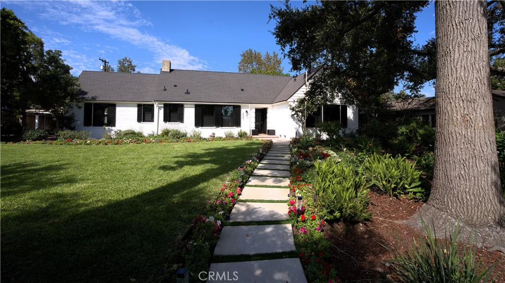 3541 Yorkshire Road Pasadena, CA 91107 - Photo 1 of 1 a front view of a house with a yard