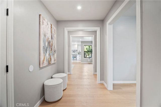 a living room with furniture and a garden
