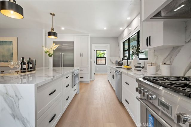 a bedroom with a bed and a chair