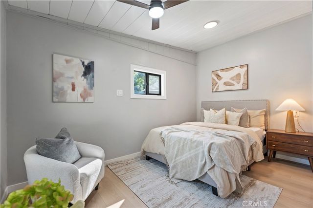 a bathroom with a sink a mirror and a shower