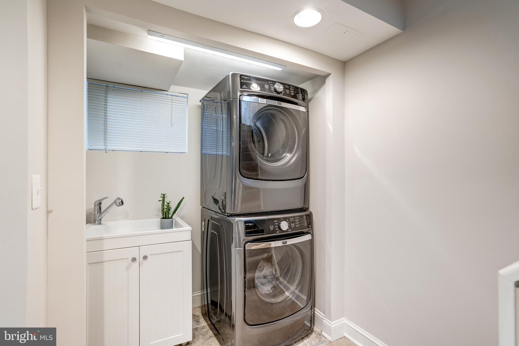 5916 Ramsgate Road Bethesda, MD 20816 - Photo 39 of 49 Lower level laundry with sink.