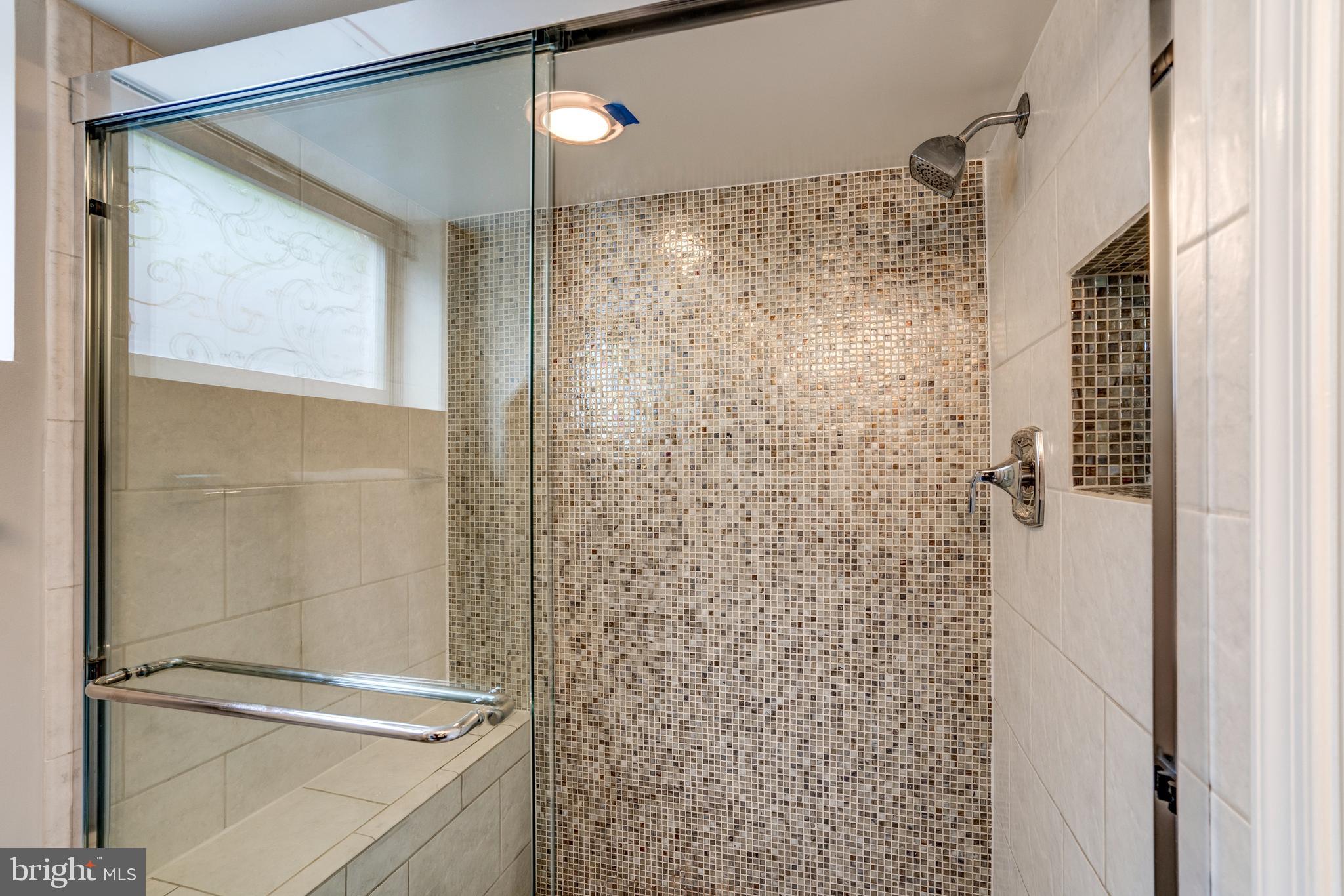 5916 Ramsgate Road Bethesda, MD 20816 - Photo 41 of 49 Custom bathroom w/beautiful tiles.